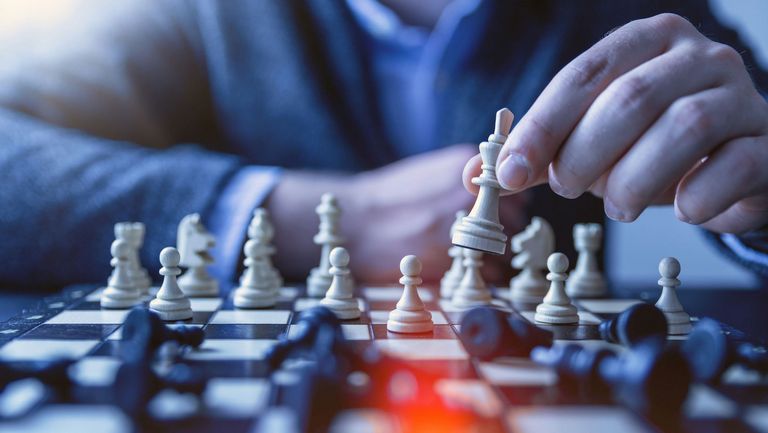 image of a men playing chess