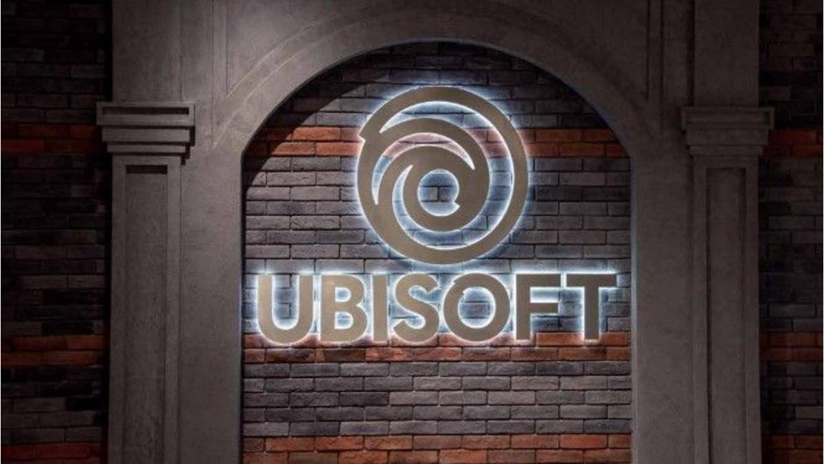 Ubisoft logo mounted on an indoor brick wall